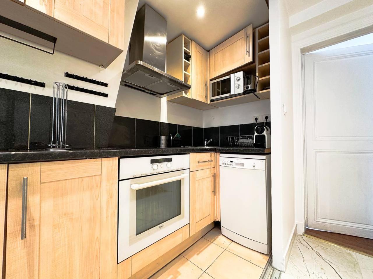 Apartment Colisee Paris Bagian luar foto